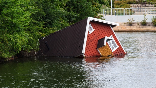 House halfway under water